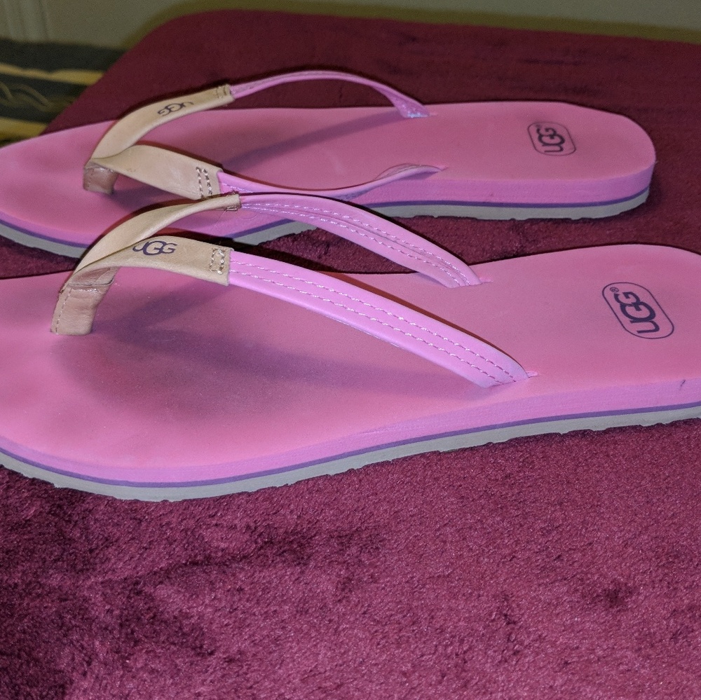 Ugg flip flops, pink, size 8.